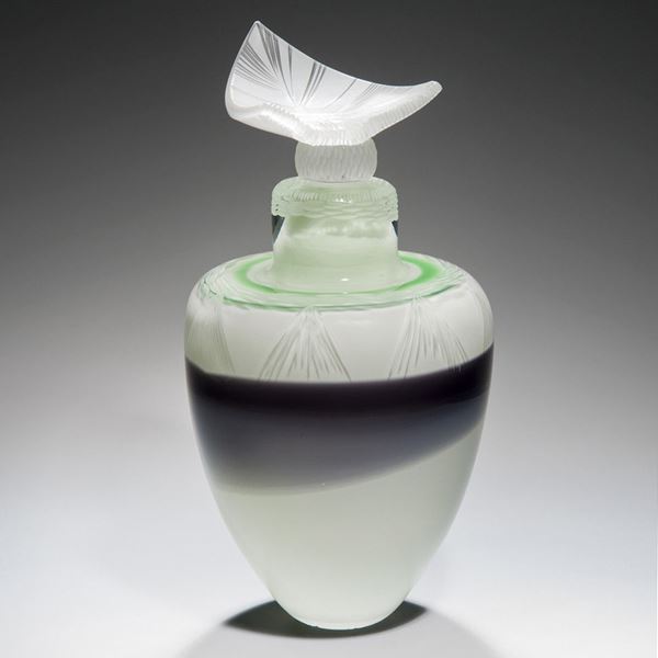 glass art of roman urn in white and black with green trim