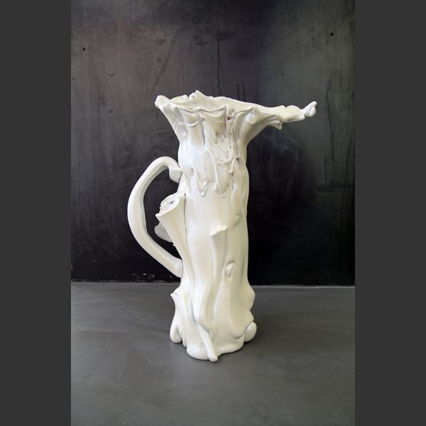 abstract contemporary art glass sculpture of a pitcher in pearly white