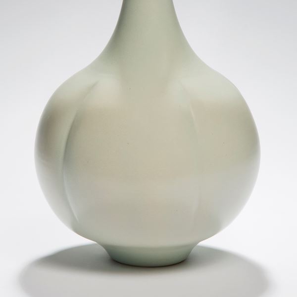 porcelain vase sculpture in green with wide botton and thin top