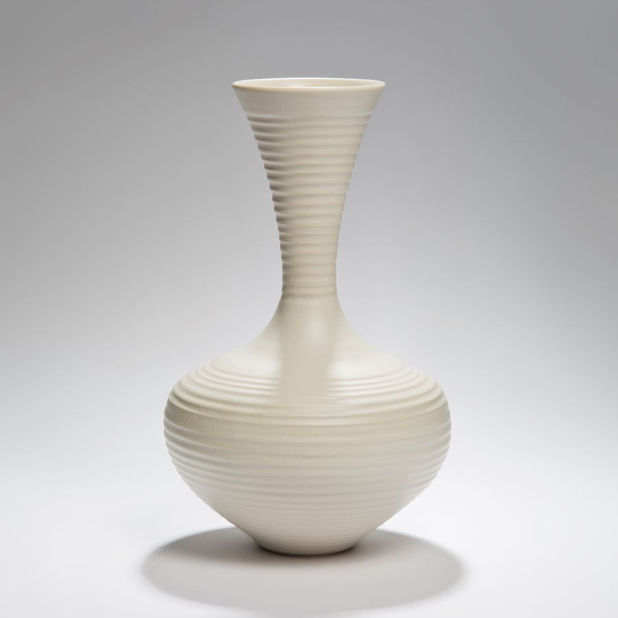 large ridged porcelain vase sculpture in cream