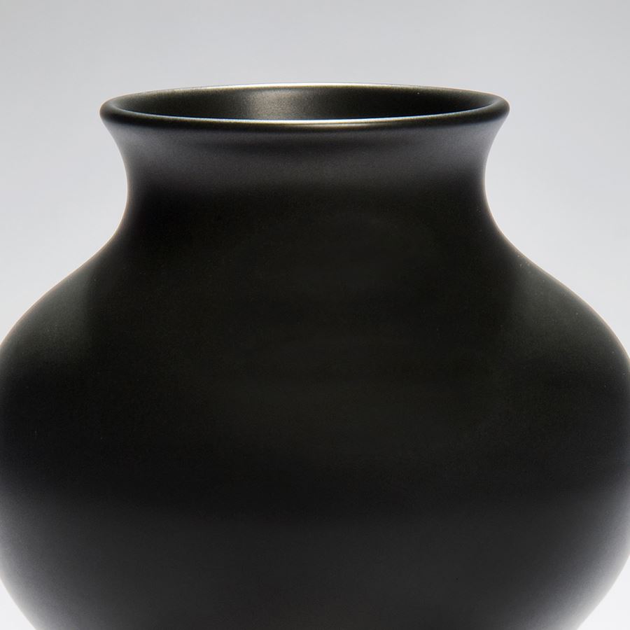 small black porcelain decorative sculpture vase with wide midriff