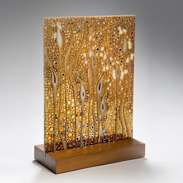 large fused glass art panel of flowers in gold