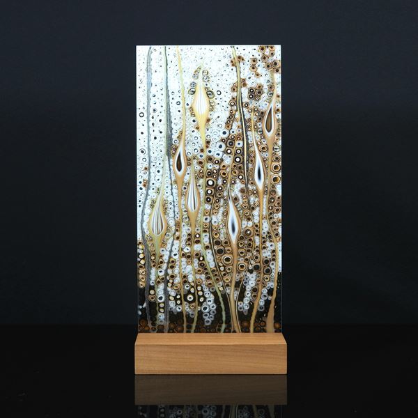 fused glass panel inspired by nature with walnut base 