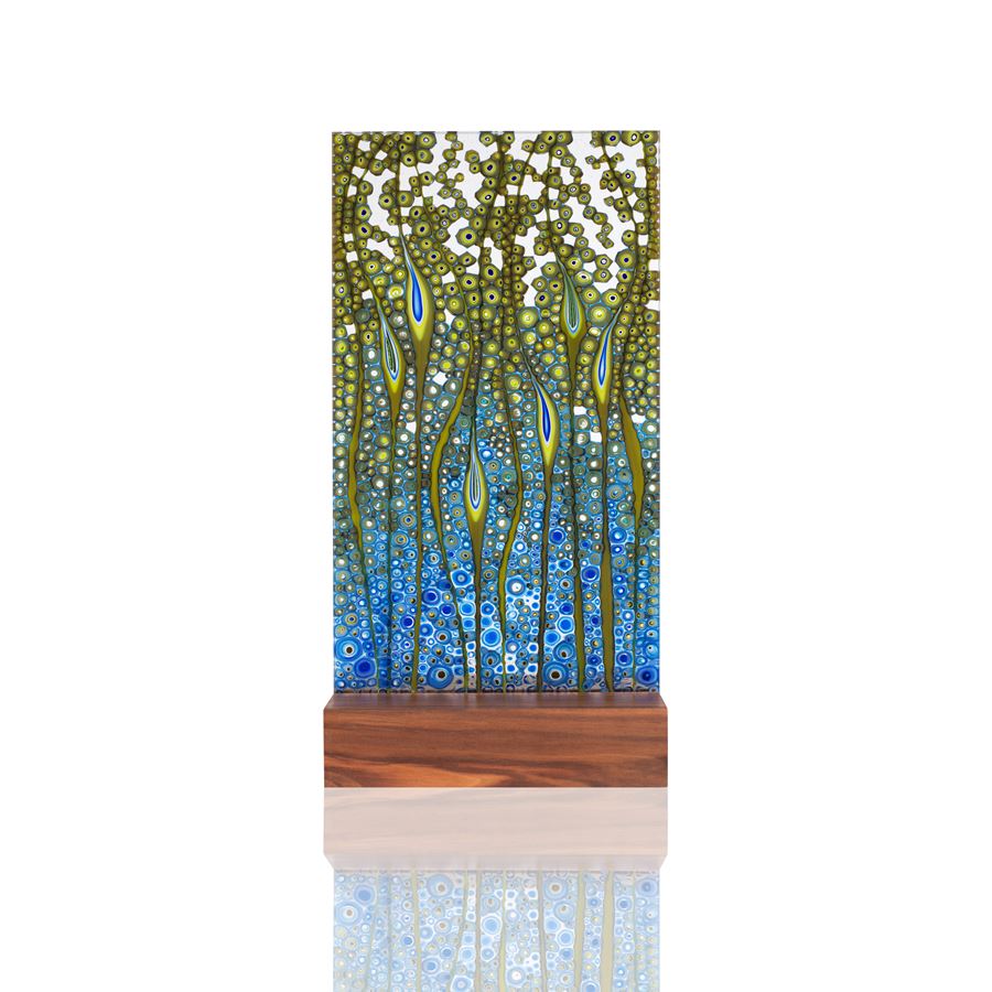 fused glass panel artwork in green and blue on wood base