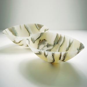 two concave art glass bowls in white with grey and beige pattern