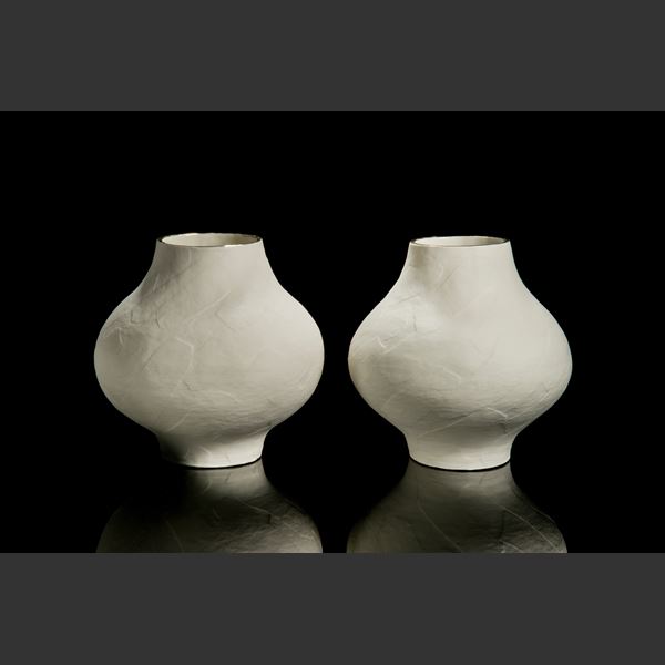 ceramic centrepiece vessel sculpture with narrow top and bottom and wide midrange