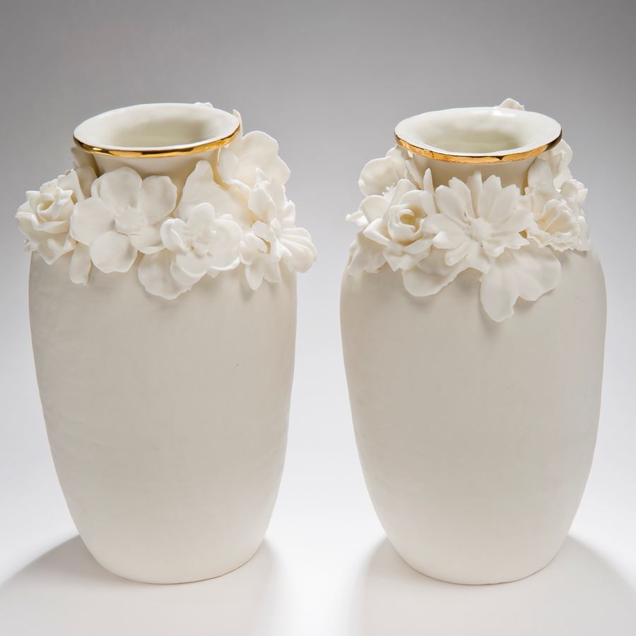 two small porcelain vases with gold lustre and floral decoration