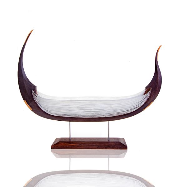 sculpture of viking longboat made from wood and white glass