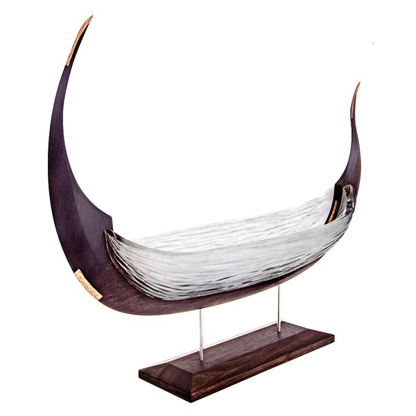 sculpture of viking longboat made from wood and white glass