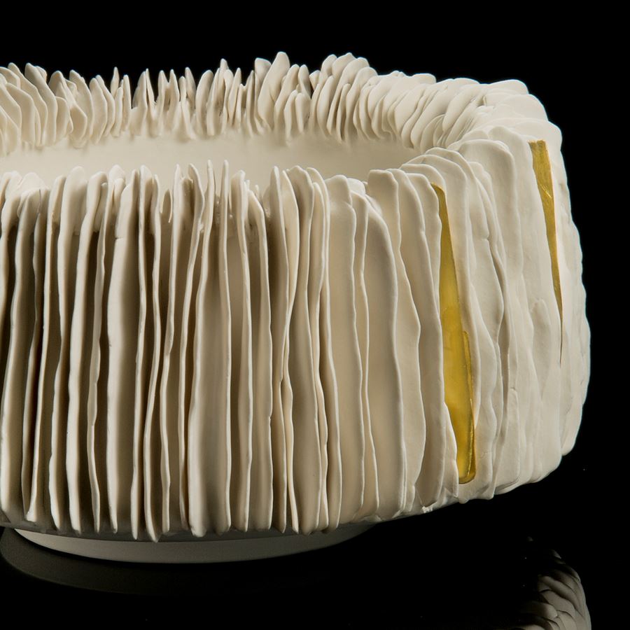 white ceramic sculpted wide vertical bowl with fanned edge