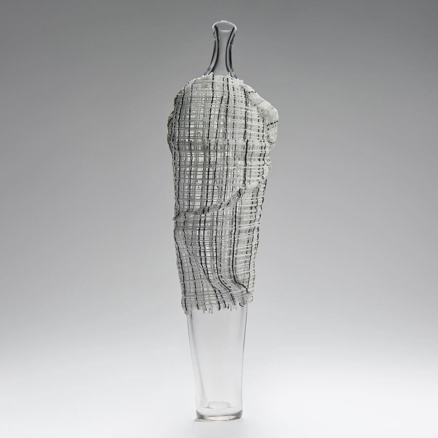 tall contemporary art-glass sculpture of vase with cane cloak resembling human form