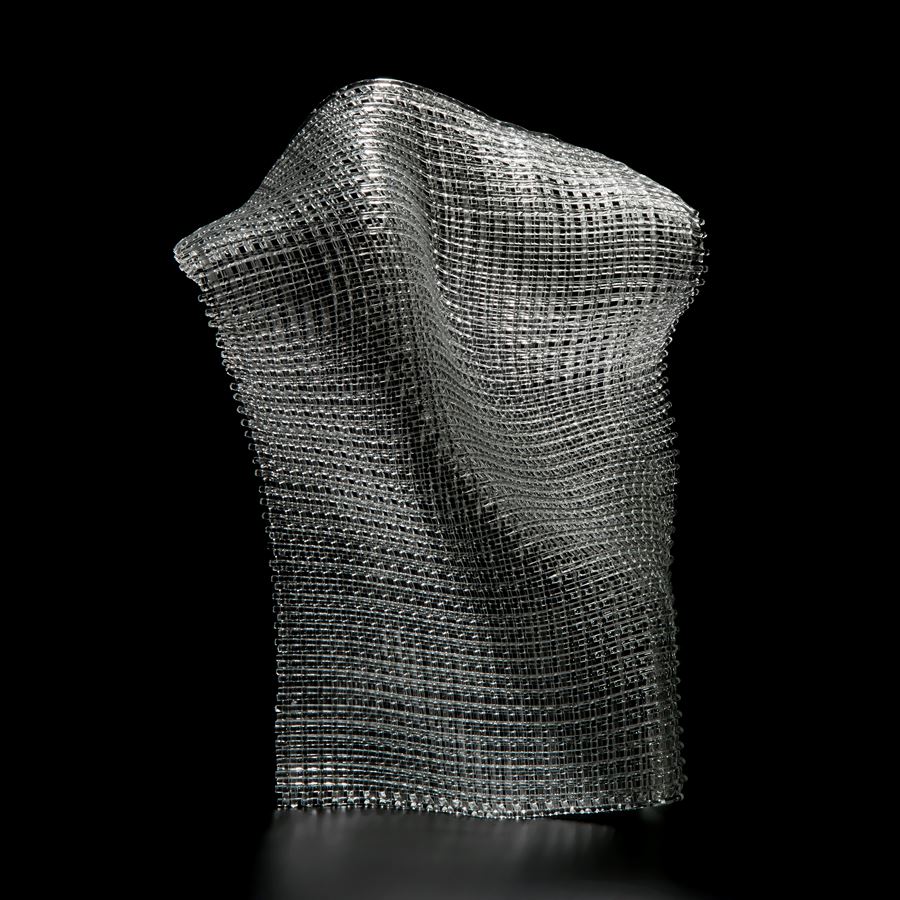 contemporary abstract art-glass sculpture resembling cloth stood upright