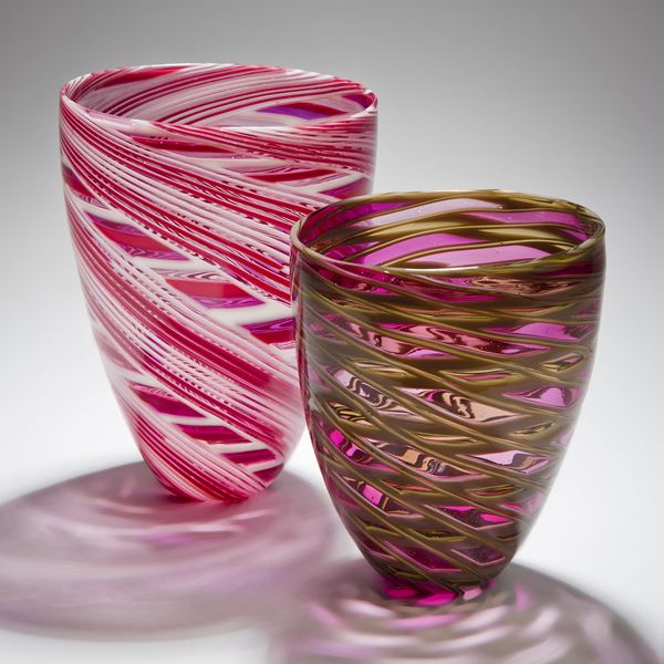 collection of free-blown art-glass short vases in orange pink and grey shades