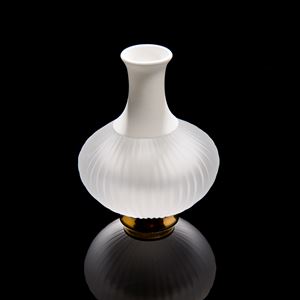 sculpted glass and porcelain vessel with wide base and long neck on gold base
