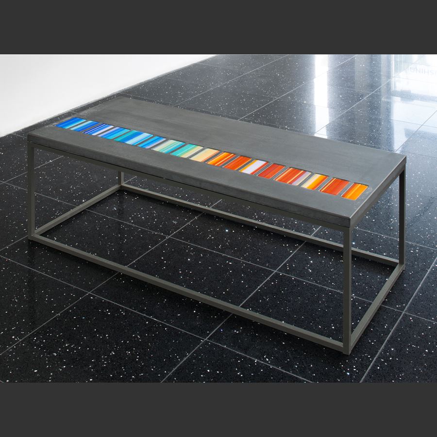 coffee table made from steel and concrete with pastel coloured art glass inlays
