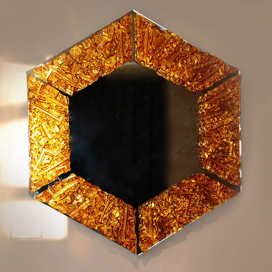 hexagonal decorative mirror with crusted amber glass border