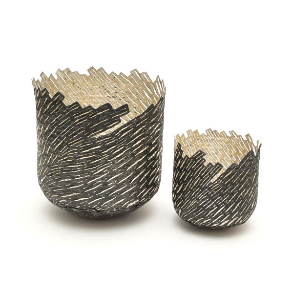 one large one small vessels with wood-like external pattern made from steel and gold