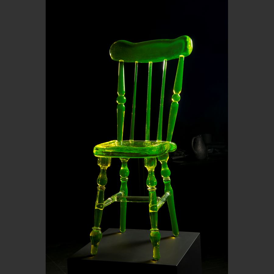 neon green coloured art glass sculpture of a chair