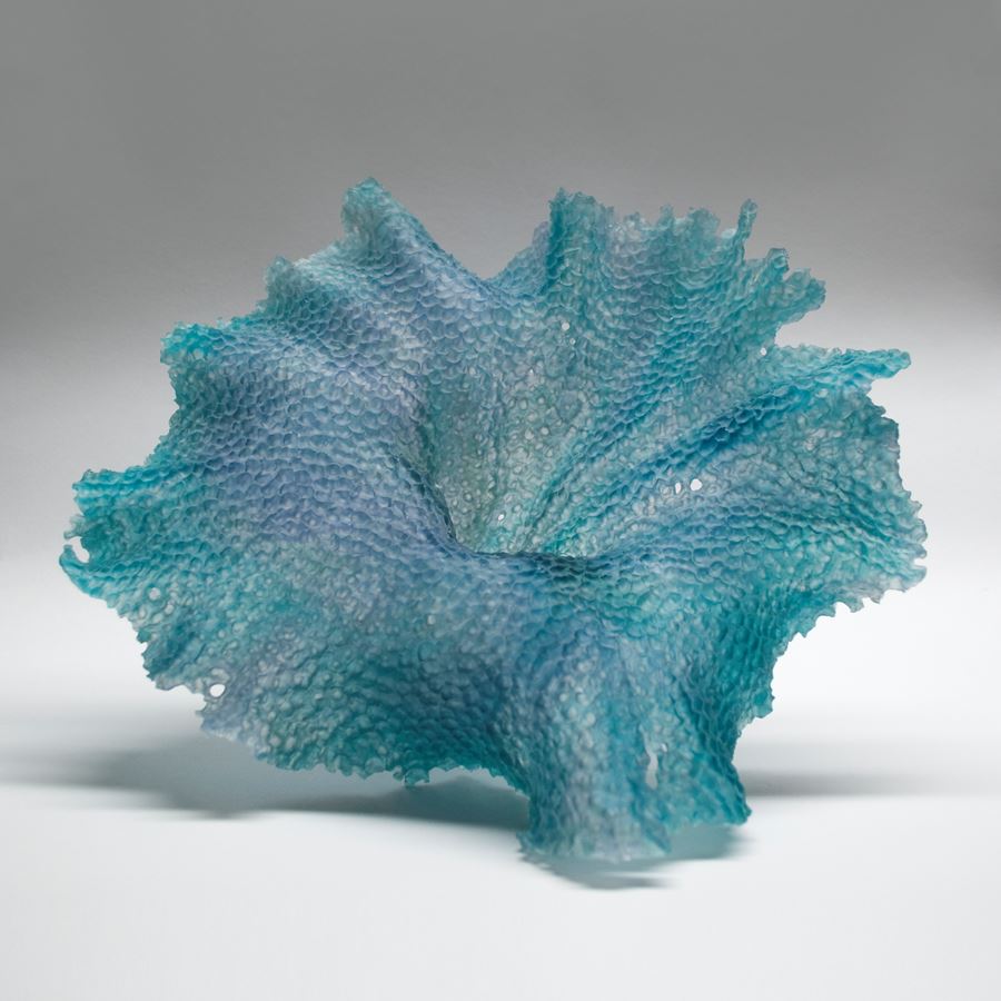 modern art glass sculpture of leaf in turquoise