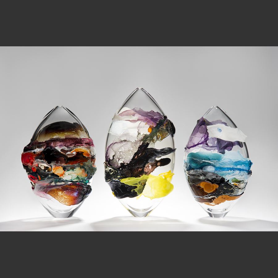 modern abstract art clear glass vessel ornament with light and dark coloured exterior