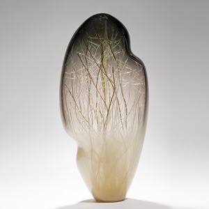 seethrough tall art glass sculpture with internal structure resembling abstract winter scene