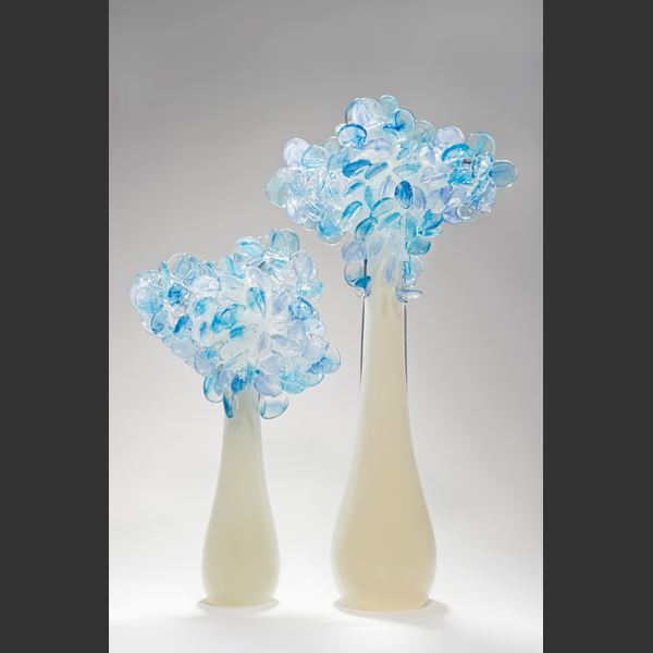 art glass sculpture of flowers in blue and pink