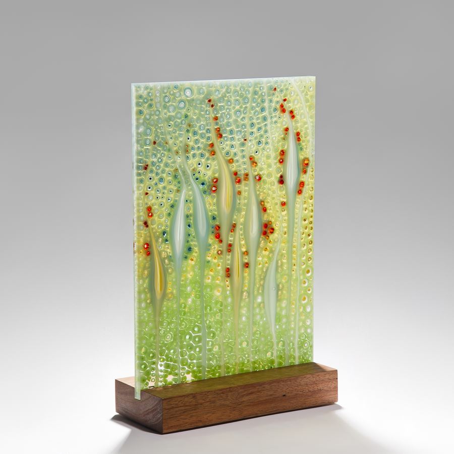 fused glass ornamental panel inspired by nature with walnut base 