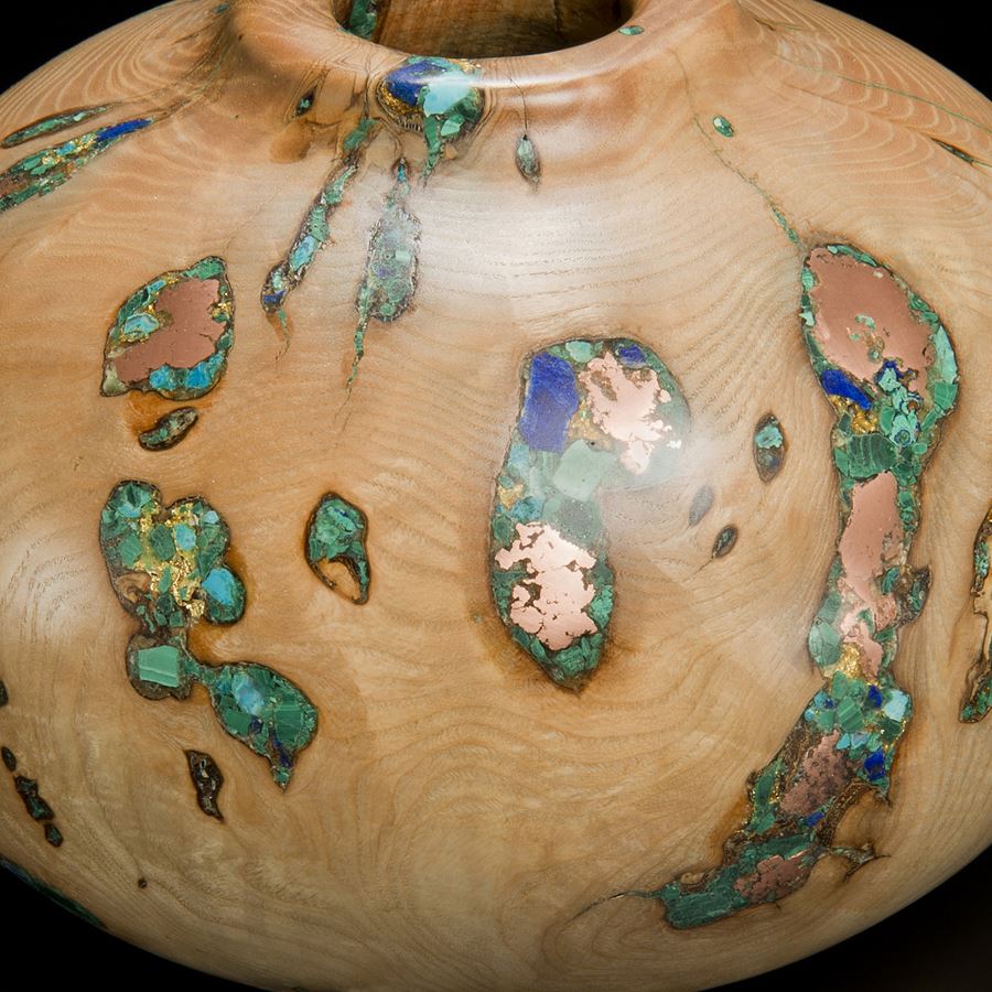 short sculpted vessel from natural looking ash wood and precious minerals in beige brown and speckled turquoise 