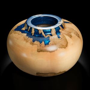 sculpted sycamore wood vessel with blue metal inlay