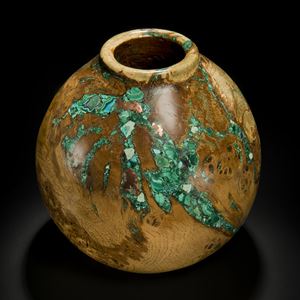 sculpted dark brown oak wood vessel laden with precious minerals in turquoise