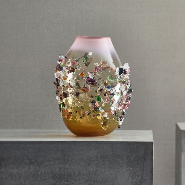 handblown glass vessel in amber and clear colours with multicoloured crystal adornments
