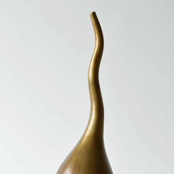 contemporary bronze vessel sculpture with long thin neck