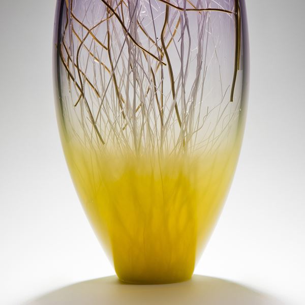 tall curved hyacinth and primrose coloured glass sculpture with delicate nature-inspired internal structure 