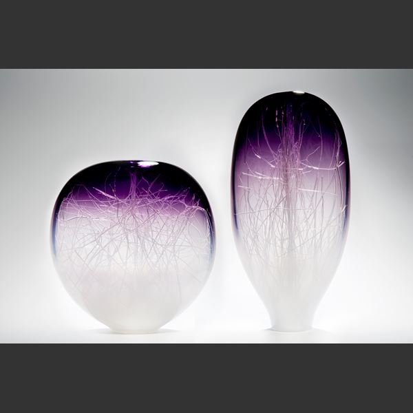 apple shaped art glass ornament in white with purple top
