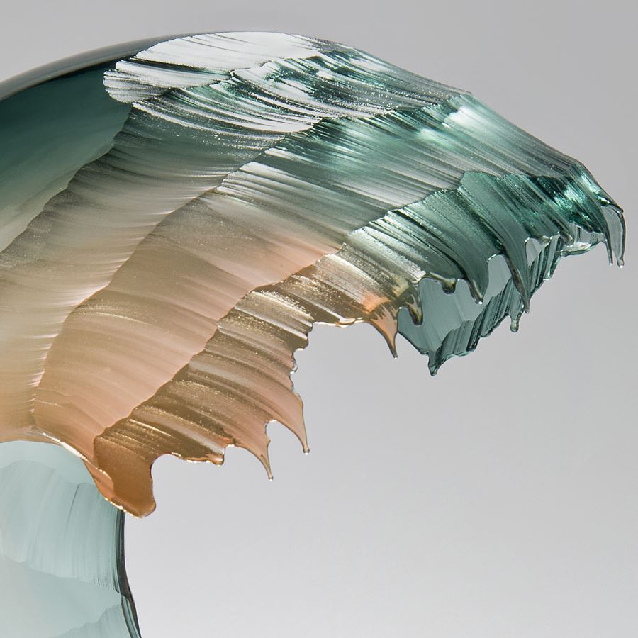 blown and sculpted art-glass ornament of wave in pink and turquoise