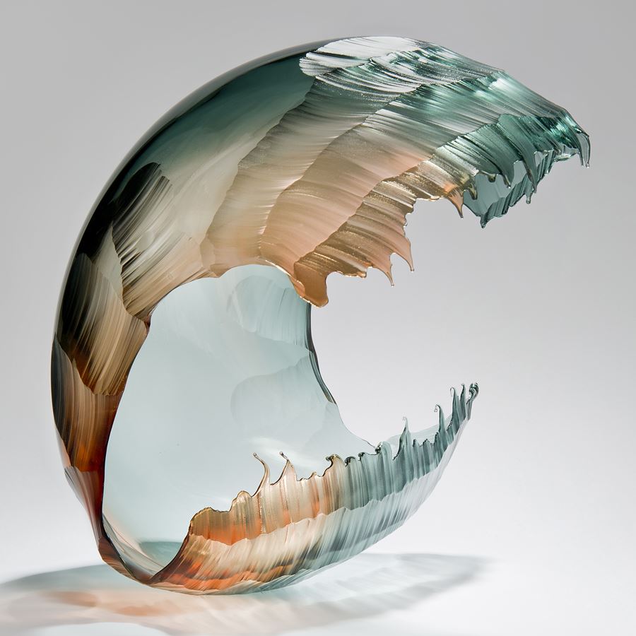 blown and sculpted art-glass ornament of wave in pink and turquoise