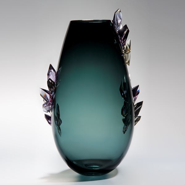tall green glass vase sculpture with lilac crystal adornments