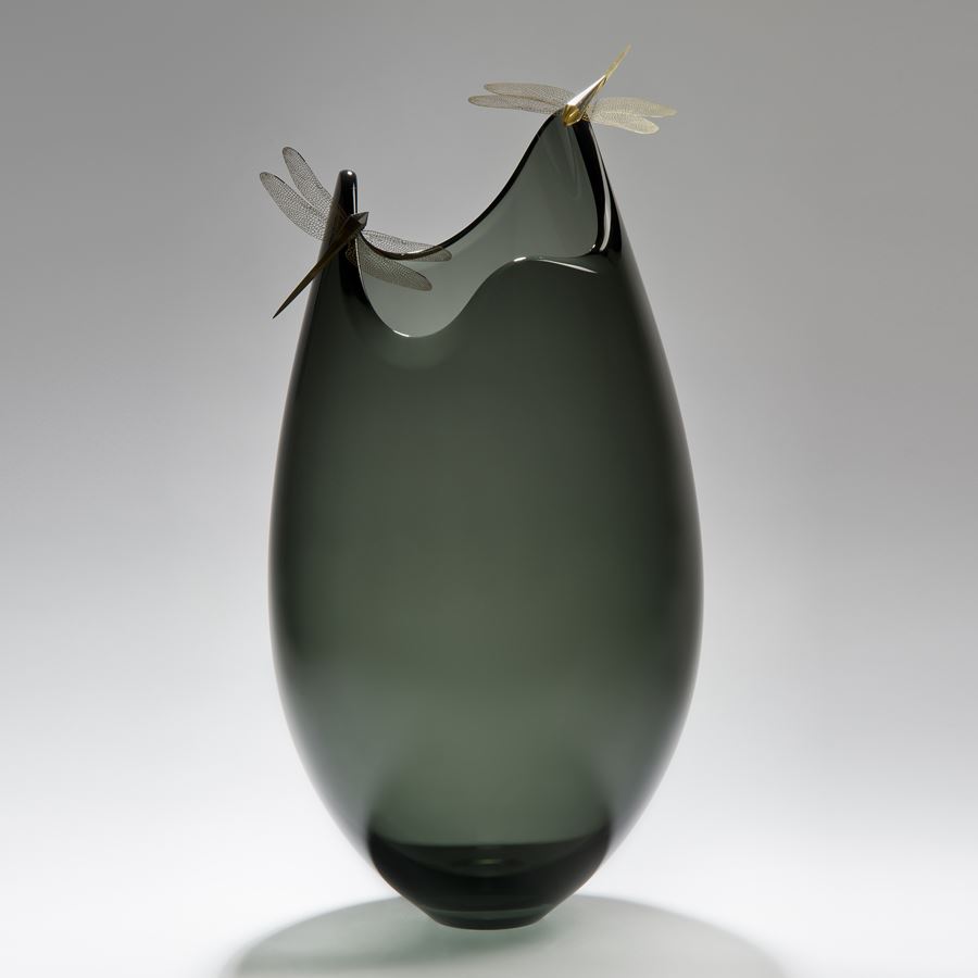 contemporary art glass sculpture of vase with assymetrical top adorned by two gold plated dragonflies