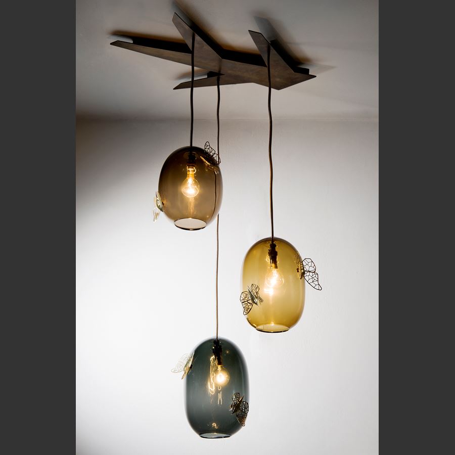 hanging light with round glass baubles decorated with butterflies and moths