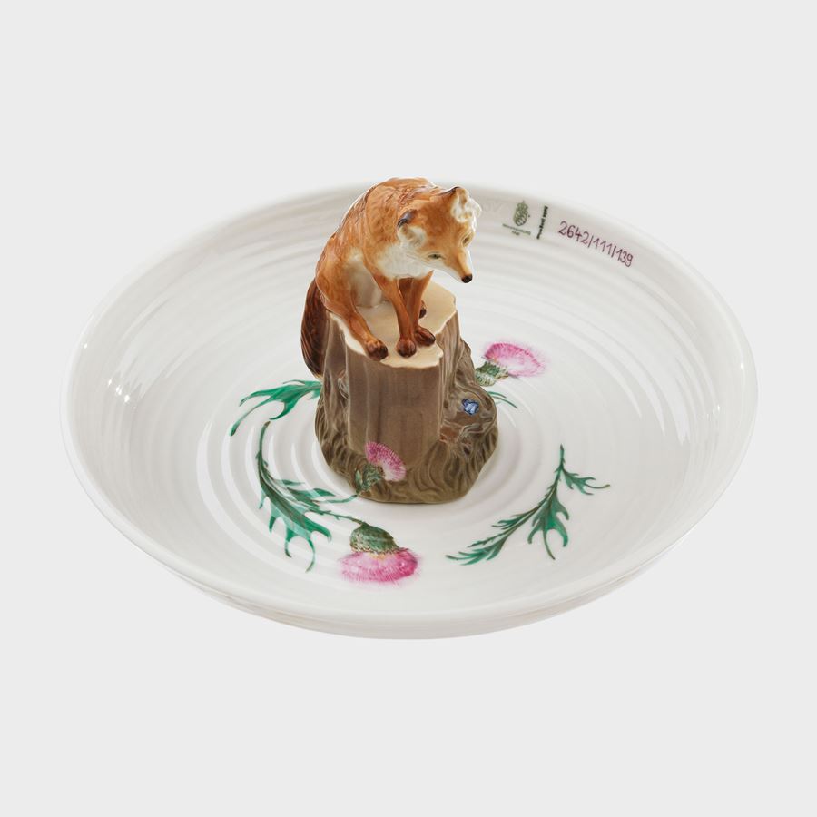 decorative porcelain bowl with model of fox sitting in the centre