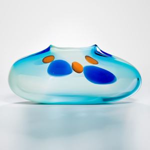 abstract turquoise glass art vase with blue and orange dots