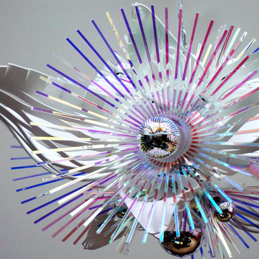 sculptured acrylic chandelier in abstract shape in white and neon colours 