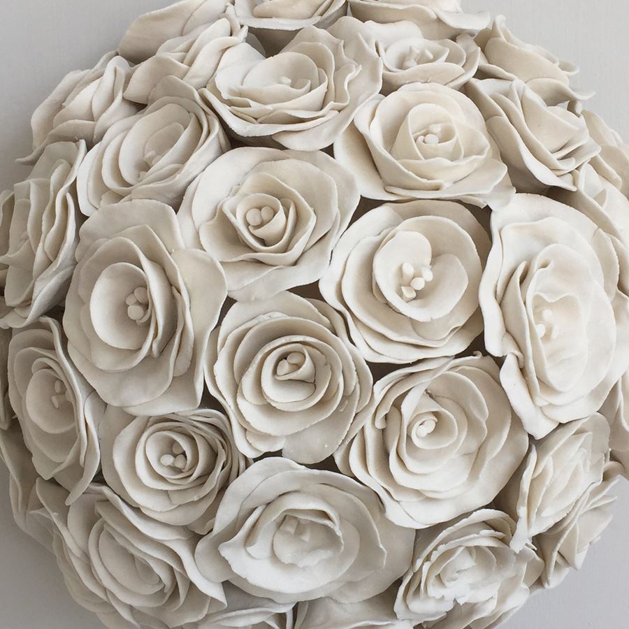 porcelain decorative ceramic sculpture of roses in white