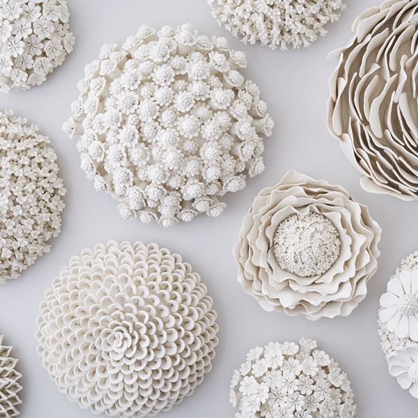 porcelain art sculpture of flowers arranged in sphere