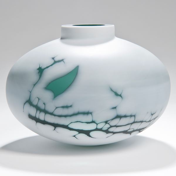 cameo glass sculpted vessel in white with faint green pattern