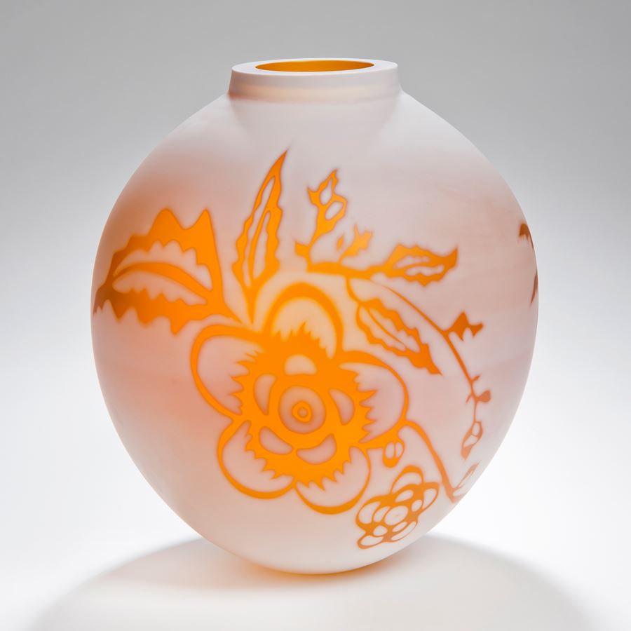 short round cameo glass vase in marble white with bright orange floral motif