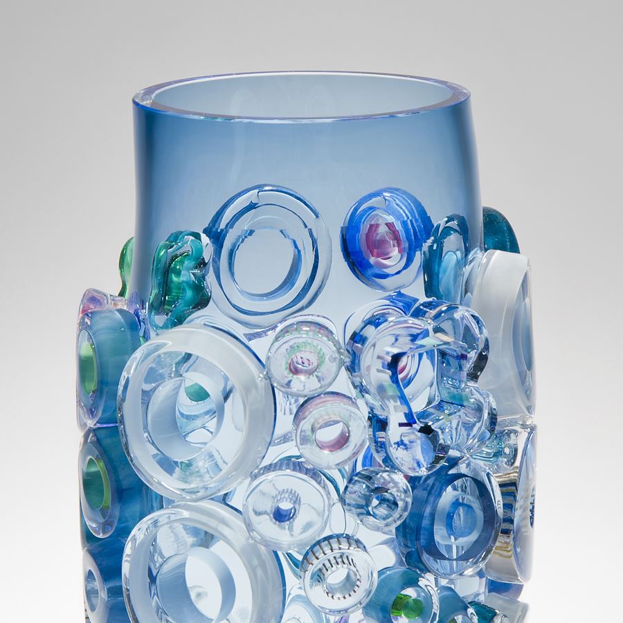 aquamarine handblown glass vase art sculpture with external circular decorations 