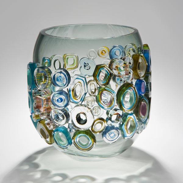 short art-glass vase sculpture in blue and green with colourful external adornments