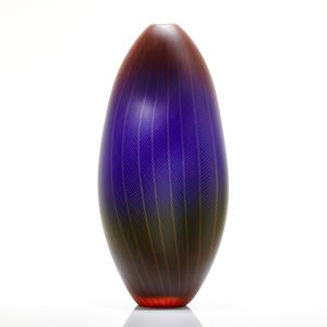 tall oblong blown glass vase in dark purple, red and black with lined and checked external engraving