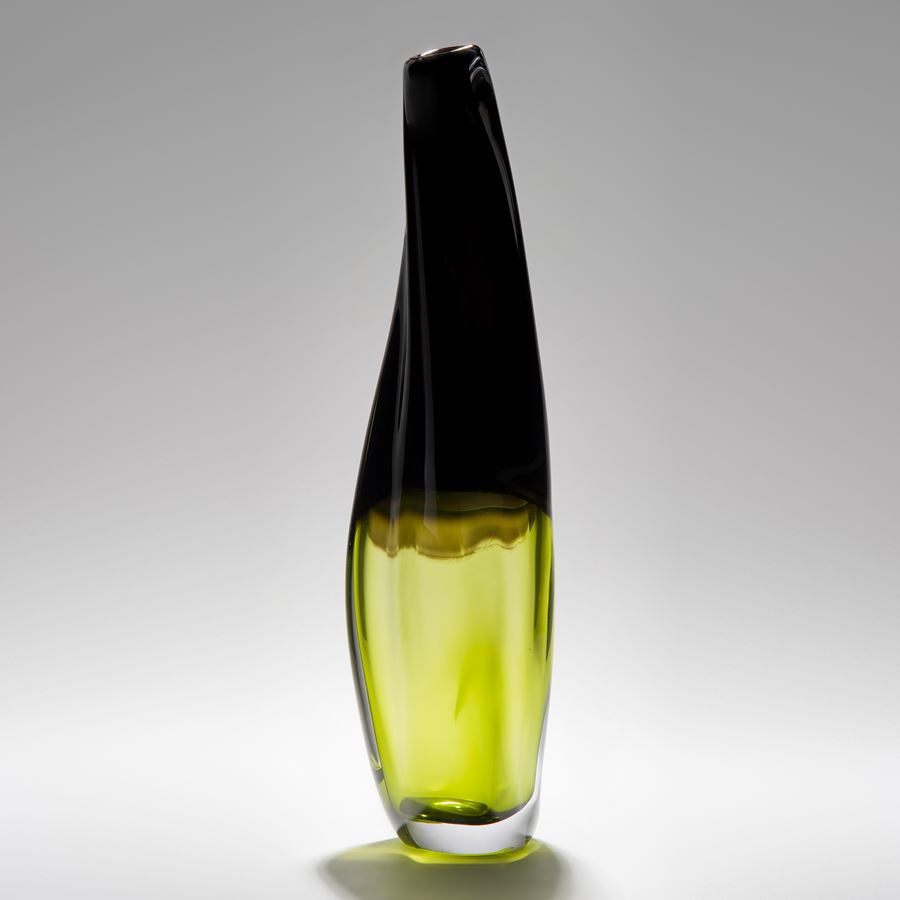 tall sculpted glass vessel in black and lime